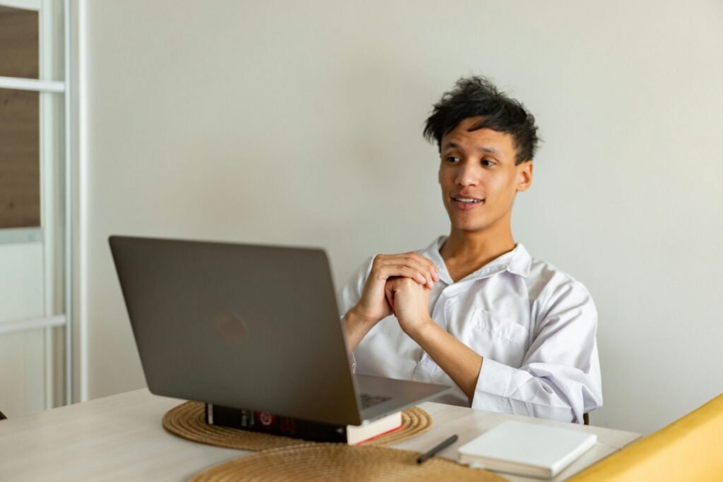 a boy learning on laptop