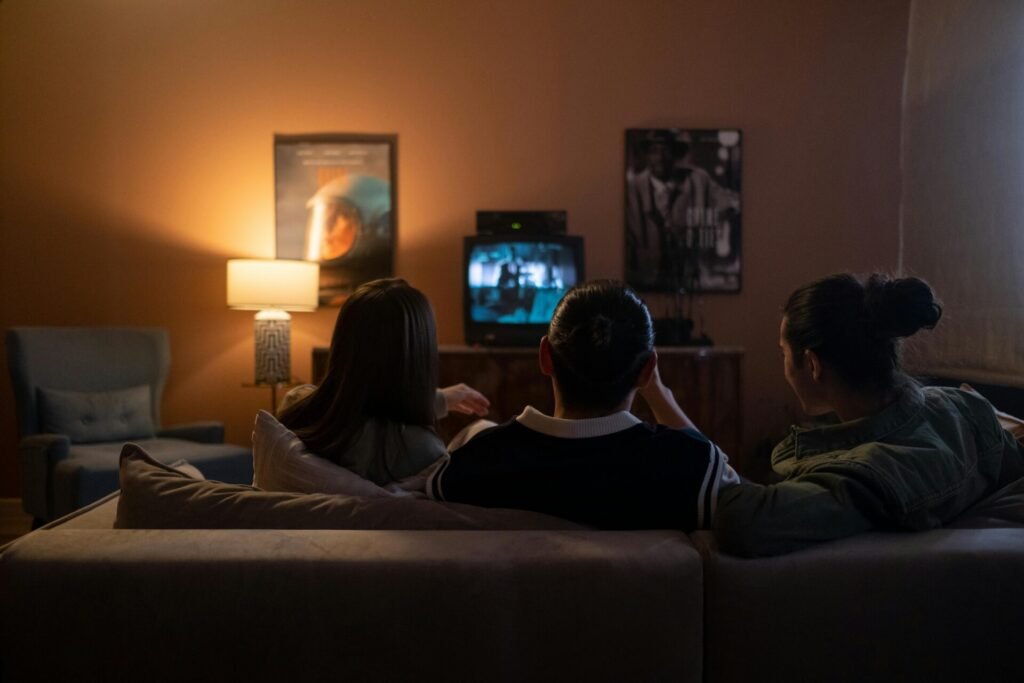 7 Exciting Family Goals to Infuse Happiness into Everyday 7 family watching a movie together