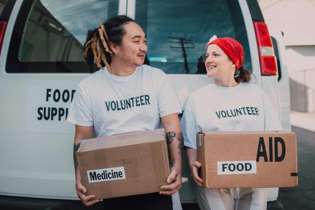 happy boy and girl volunteer for giving back to community