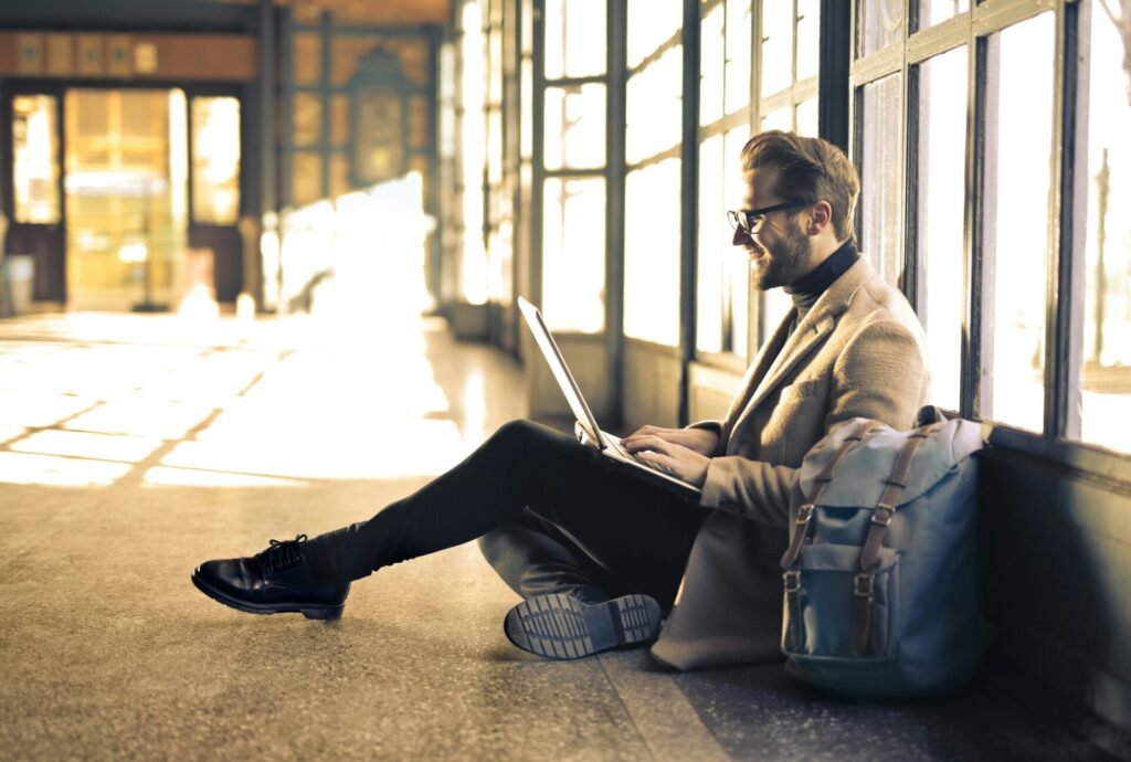 happy man with a laptop