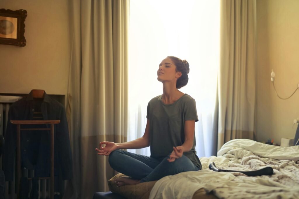 girl practicing meditation in the room  