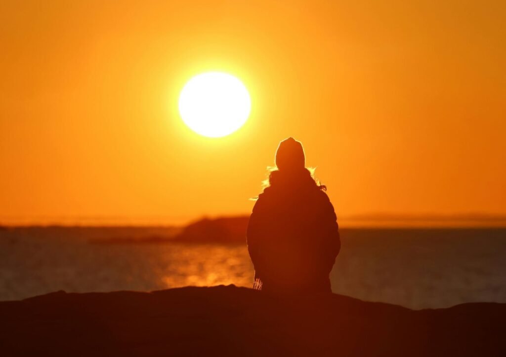 man watching the sunrise 